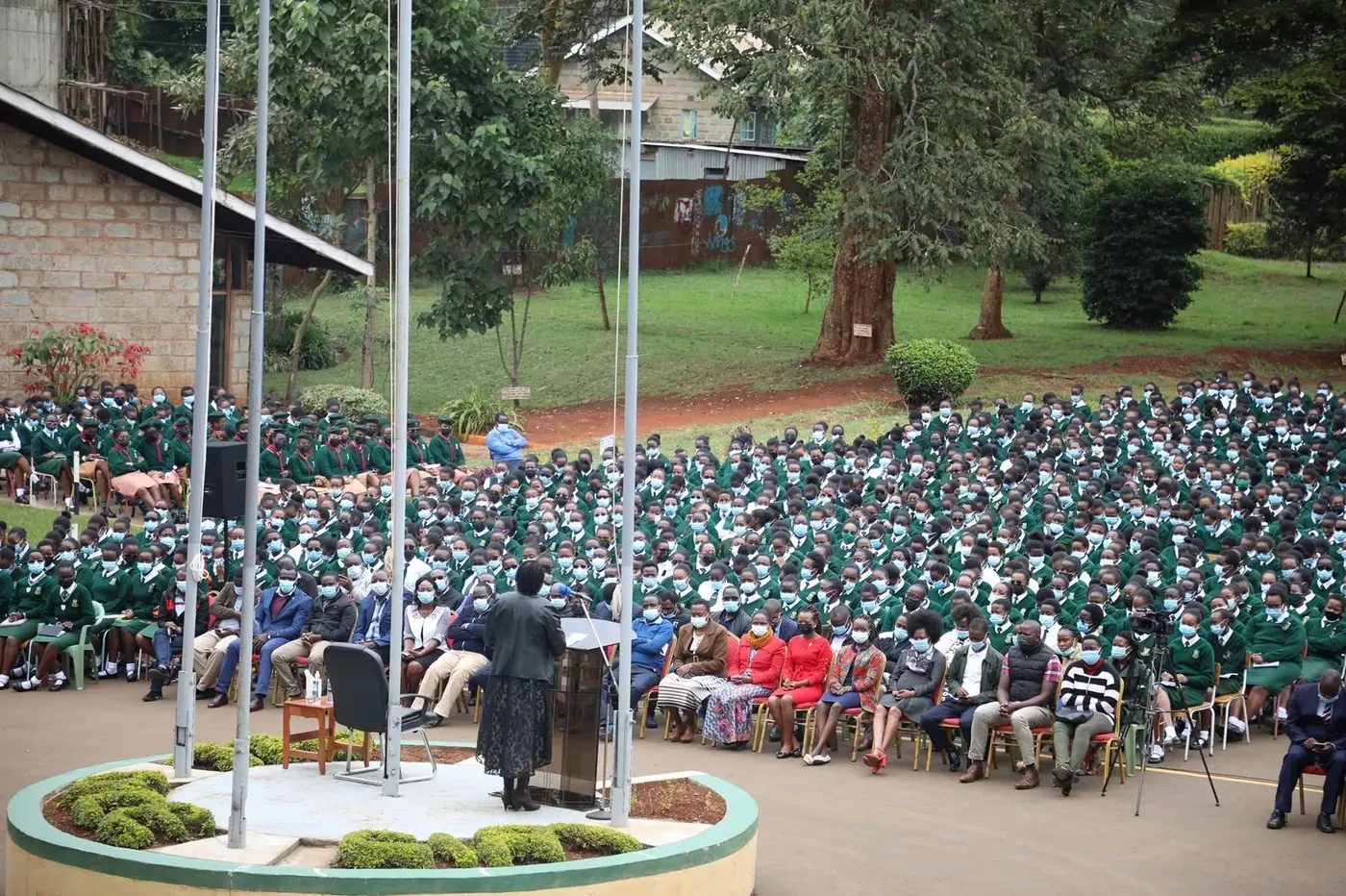 An address to the school from the parade-ground podium
