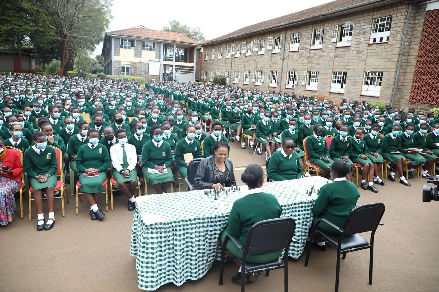 A chess match before the assembled school